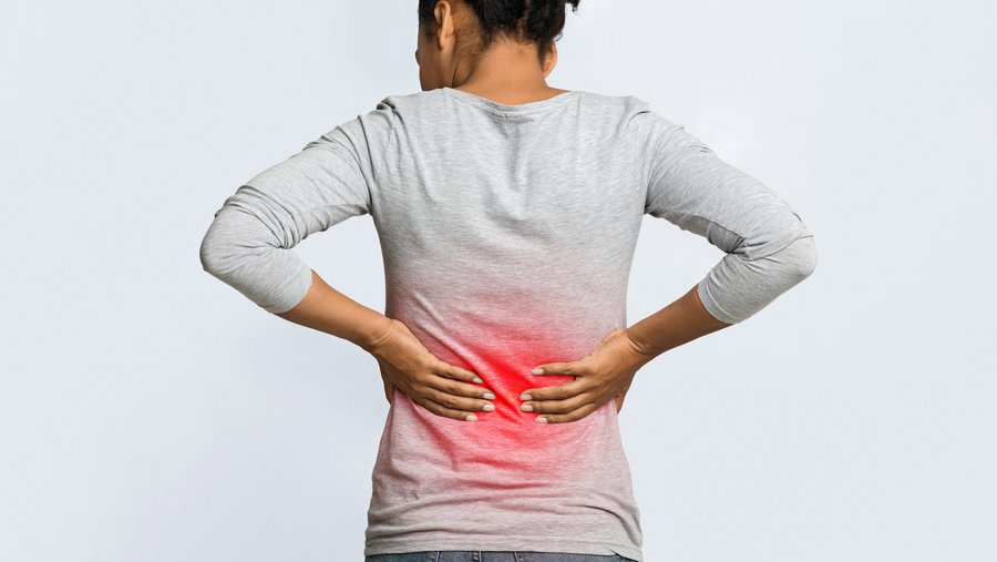 riwospine-lumbar-pain-woman-lower-back-treatment.png Woman with lower back pain – lumbar disc herniation or sciatica symptoms