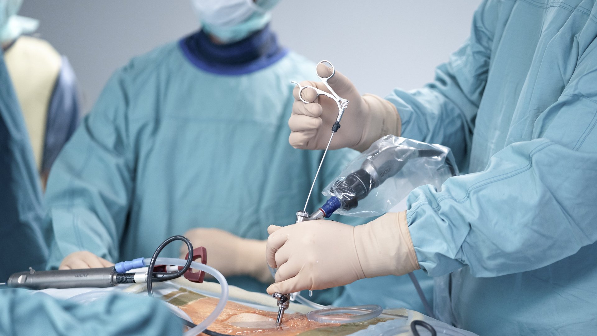 Surgeons performing minimally invasive full-endoscopic spine surgery with RIWOspine system