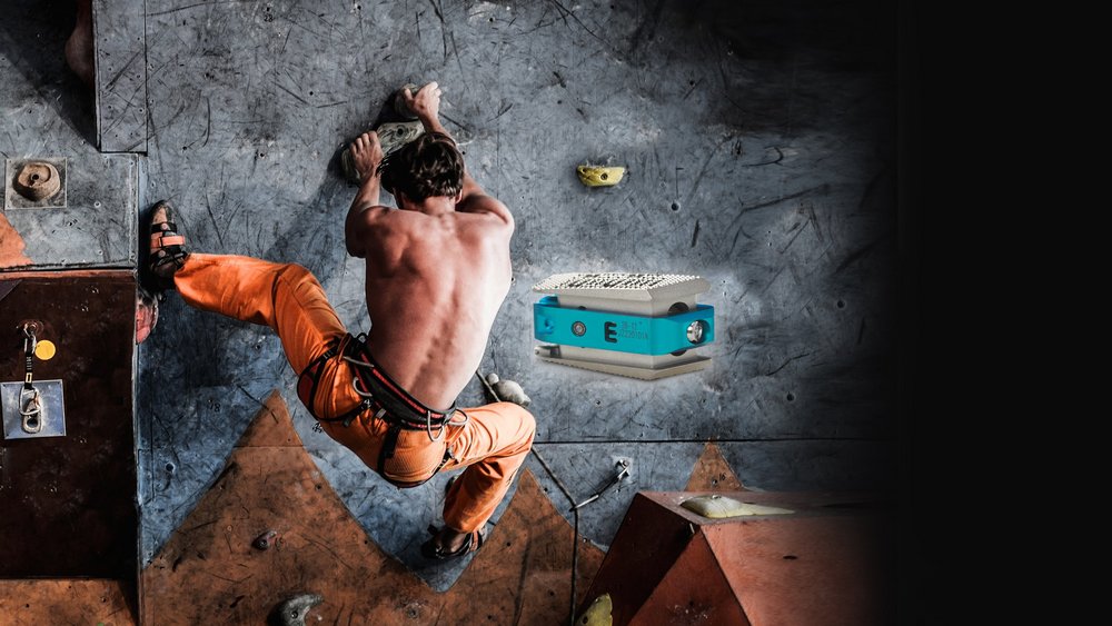 Man climbing wall symbolizing strength and mobility after spinal fusion with eFuse® device